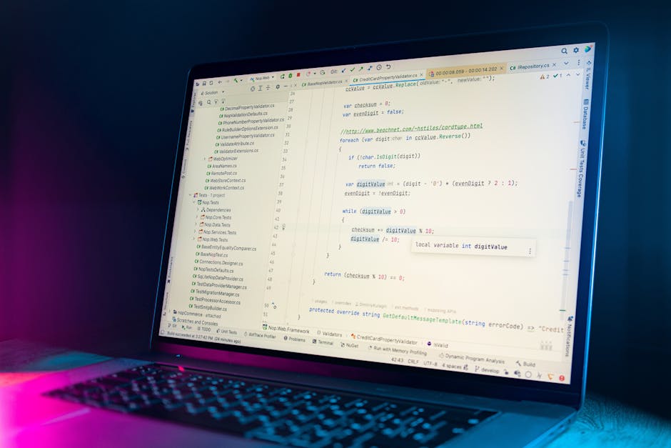 A computer screen displaying lines of code on a dark background, predominantly featuring red, green, blue, and purple syntax highlighting. The text appears slightly blurred, with some parts of the cod